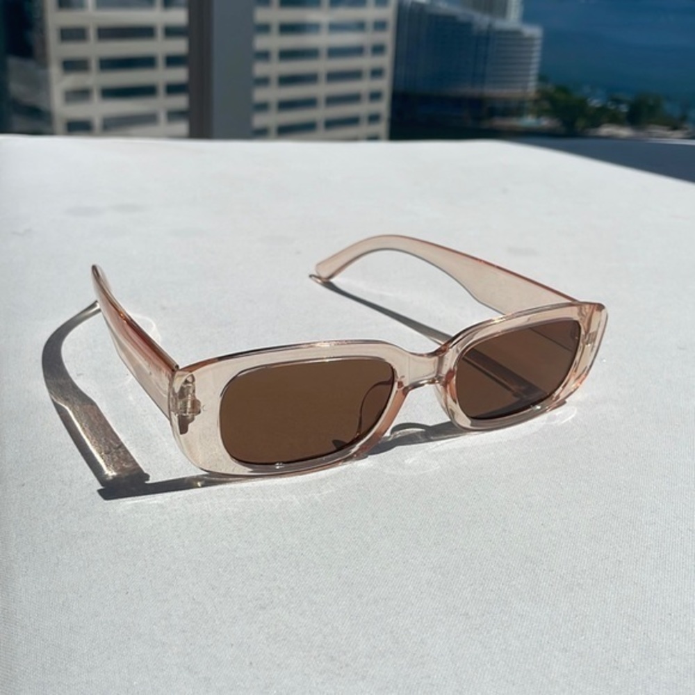 Translucent pink rectangle sunglasses